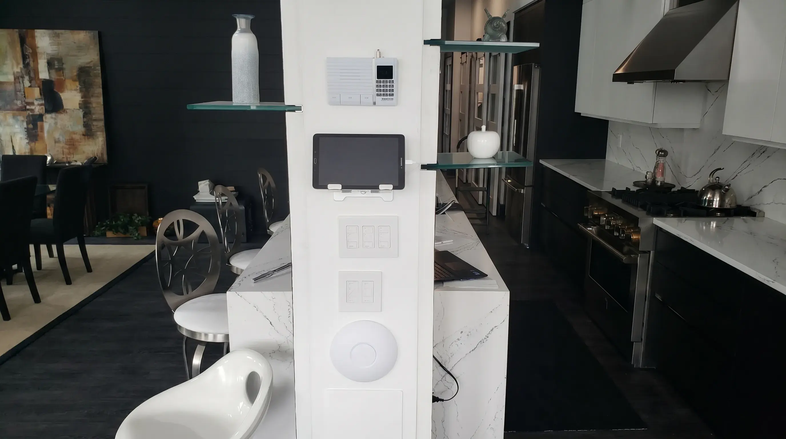 Smart home controls mounted on a wall in a modern interior